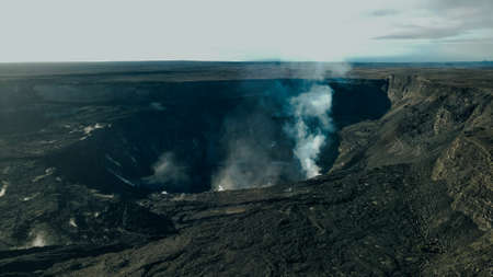 Helicopter over Kilauea Volcano in Hawaii Volcanoes National Park on the Big Island.の写真素材