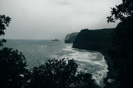 Scenic Pololu Valley vista on a rainy day on the Big Island of Hawaii.の写真素材