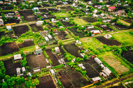 RUSSIA, krasnoyars - 13 JUN, 2020 Aerial view of cottages near the big wood. High quality photoの写真素材