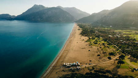 CHIRALI, TURKEY: aerial view Sunny beach resort in Turkey with stunning views of the mountainsの写真素材