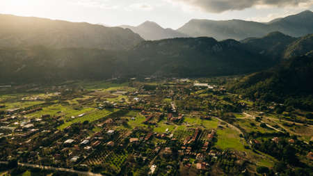 CHIRALI, TURKEY: aerial view Sunny beach resort in Turkey with stunning views of the mountainsの写真素材