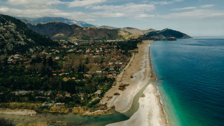 CHIRALI, TURKEY: aerial view Sunny beach resort in Turkey with stunning views of the mountainsの写真素材