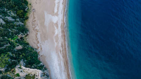CHIRALI, TURKEY: aerial view Sunny beach resort in Turkey with stunning views of the mountainsの写真素材