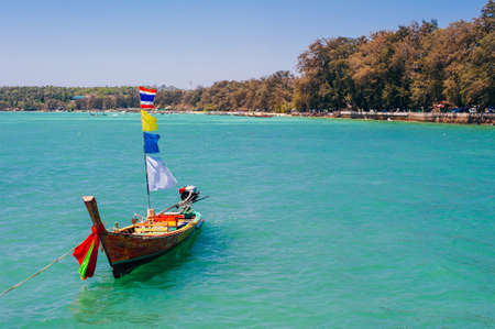 Long boat and tropical beach, Andaman Sea, Thailand. High quality photoの写真素材