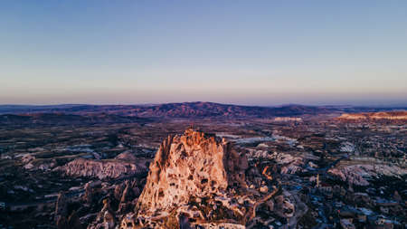 Turkey. Cappadocia. aerial View on rock-castle of Uchisar castle at a sunset. High quality photoの写真素材