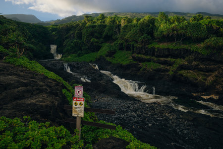 Dramatic series of waterfalls of Ohe'o Gulch cascading down a rocky under a bridge, in Haleakala National Park, Kipahula, Maui, Hawaii, USA. High quality photoのeditorial素材