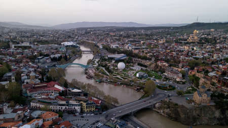 Aerial view of center of Tbilisi, bridge of peace over river Kura. High quality photoの写真素材