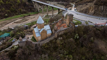 Two of Medieval Churches in Ananuri Fortress Against the Emeral Green Water of Jinvali Reservoir,...