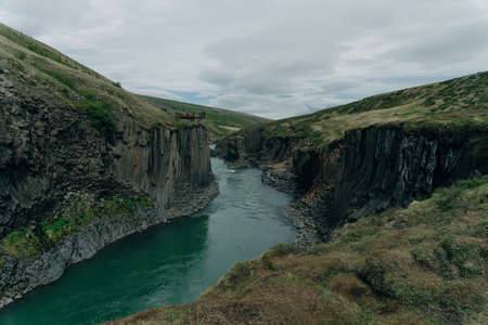 The Green River Through Studlagil Canyon, Iceland. High quality photoの写真素材