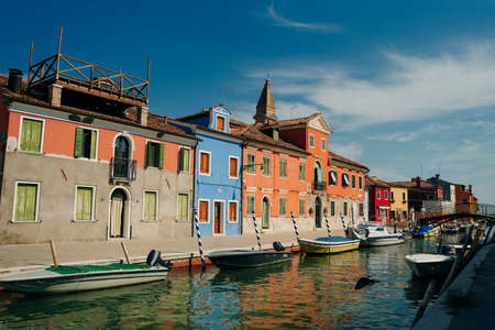 Burano, Italy - Nov, 2021 View of the colorful Venetian houses along the canal. High quality photoのeditorial素材