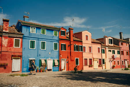 Burano, Italy - Nov, 2021 View of the colorful Venetian houses along the canal. High quality photoのeditorial素材