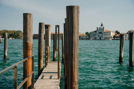 Beautiful seascape of Venice near by the pier in front of the basilica historical building by the ocean. High quality photoの写真素材