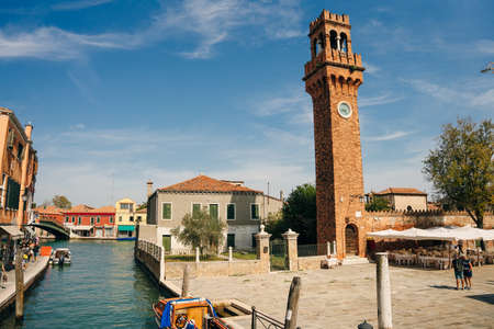 Church of Santa Maria e San Donato and bell tower brick building on Campo San Donato square in Murano, italy - nov, 2021. High quality photoのeditorial素材