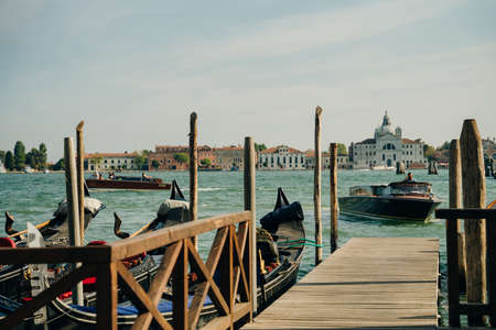 Beautiful seascape of Venice near by the pier in front of the basilica historical building by the ocean. High quality photoのeditorial素材