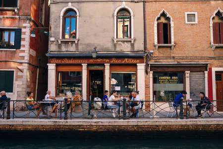 View of old narrow street in Venice, Italy. Architecture and landmark of Italy. Cozy cityscape of Rome. High quality photoのeditorial素材