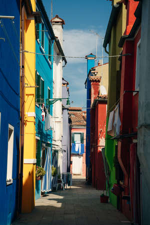 BURANO, ITALY - nov, 2021 Burano island with beautiful multi colored houses and a group of tourist visiting the village. High quality photoのeditorial素材