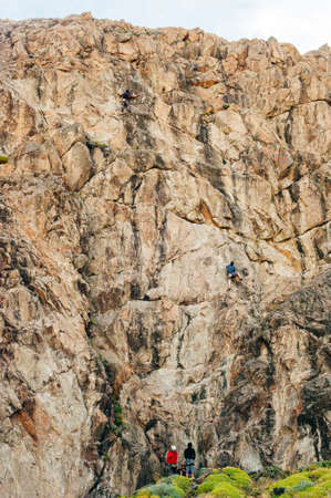 rock climbers on a stone wall in El Chalten, Argentina.の写真素材