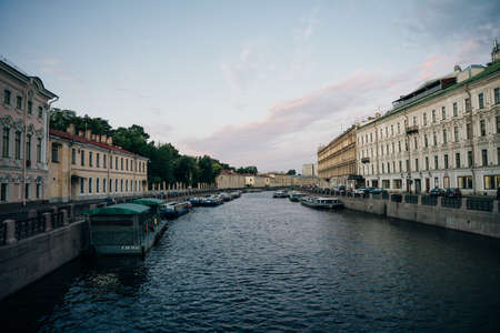 St. Petersburg, Russia - August 2021 River channel with boats in Saint-Petersburg. Summer. High quality photoのeditorial素材