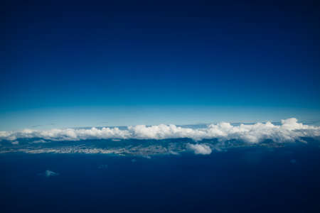 clouds over the islands of hawaii. High quality photo