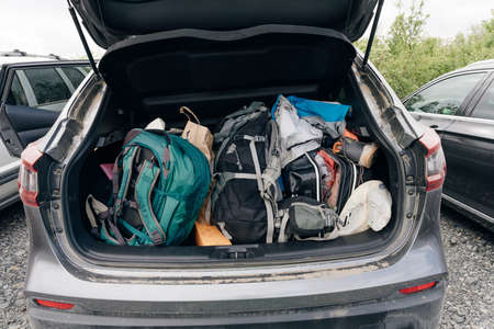 Trunk of a car loaded with travel camping equipment in Iceland. High quality photoの写真素材