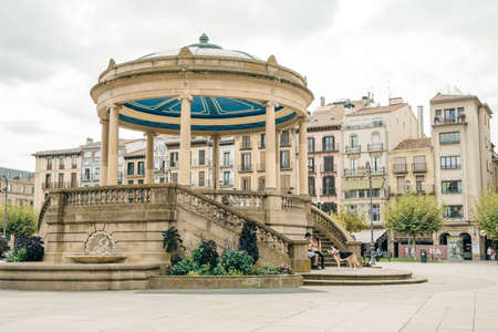 Pamplona Navarra - plaza del Castillo square after rain with dramatic sky. High quality photoのeditorial素材