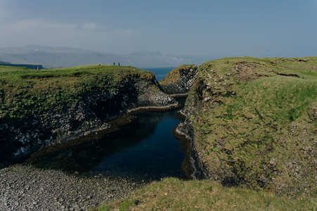 Iceland nature landscape on Arnarstapi Snaefellsnes. From Arnarstapi harbor, Iceland. High quality...