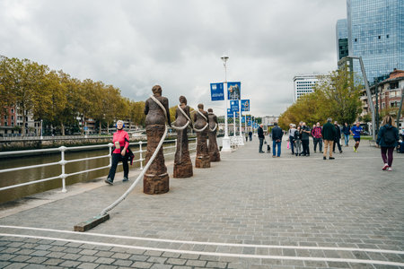 bilbao, spain - dec, 2021 Las Sirgueras, the women pulling the boats through a towline. High quality photoのeditorial素材