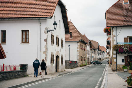 village Espinal, SPAIN- Nov 2020: Street in village of company town, colonia guell. High quality photoのeditorial素材