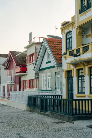 Street with colorful houses in Costa Nova, Aveiro, Portugal - november, 2021. High quality photoのeditorial素材