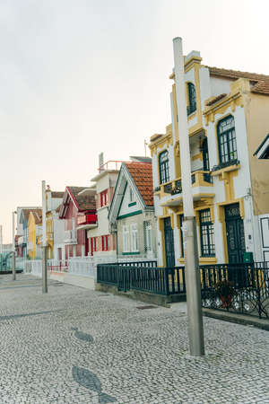 Street with colorful houses in Costa Nova, Aveiro, Portugal - november, 2021. High quality photoのeditorial素材