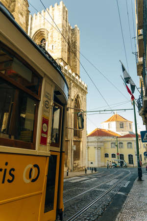 Beautiful image of the traditional yellow trams in Lisbon, Portugal - nov, 2021. High quality photoのeditorial素材