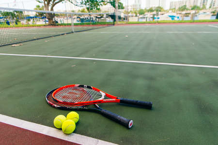 Sport. Close up picture of racket and tennis ball on court. Sport, healthy and lifestyle concept.の写真素材