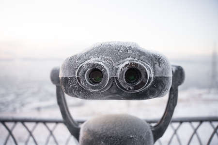 tourist binoscope on the observation deck in siberia in wintertime. high quality photoの写真素材