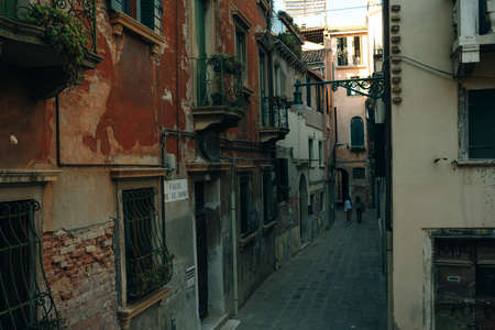Italy - nov, 2021. The cityscape and architecture of Venice. Urban canal and boats on it. high quality photoのeditorial素材