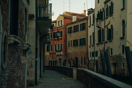 Italy - nov, 2021. The cityscape and architecture of Venice. Urban canal and boats on it. high quality photoのeditorial素材