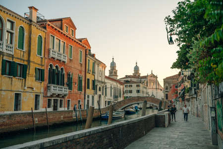 Italy - nov, 2021. The cityscape and architecture of Venice. Urban canal and boats on it. high quality photoのeditorial素材