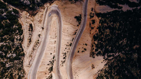top view of the serpentine in the highlands. The road is laid in the rock. high quality photo