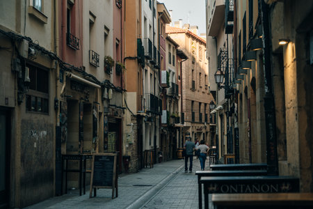 LOGRONO, SPAIN - nov, 2021 Narrow street with restaurants . Logrono, Spain. high quality photoのeditorial素材
