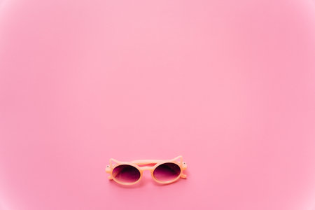 Different stylish sunglasses on pink background. high quality photoの写真素材