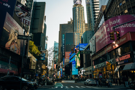 Famous Times Square landmark in New York downtown with mock up billboards for advertising and...