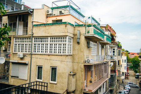 Colorful traditional houses with wooden carved balconies in the Old Town of Tbilisi, Georgia - Sep 2022. High quality photoのeditorial素材