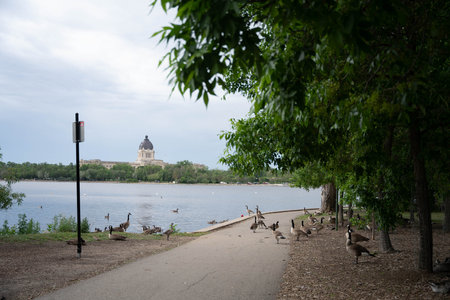 Regina, Saskatchewan Canada - June 2022 Saskatchewan Legislative Building in front of the Wascana lake. high quality photoのeditorial素材