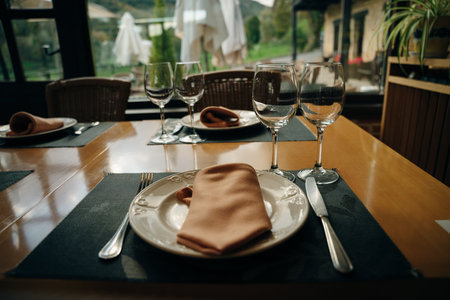 Beautiful table setting for dinner in a restaurant. High quality photo