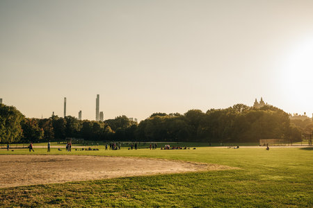 THE MALL, CENTRAL PARK, NEW YORK, USA-AUG, 2022: People walking down through the Mall in the Park. high quality photoのeditorial素材