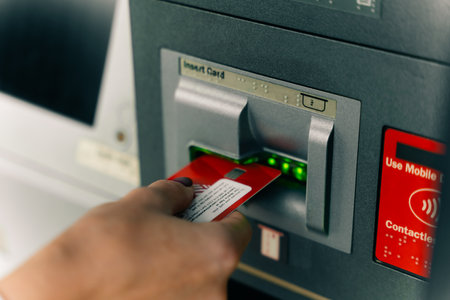 girl with a bank card at an ATM. high quality photo