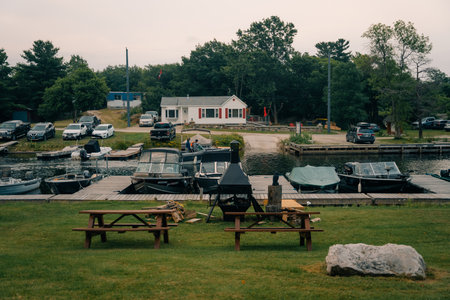 Bass Lake, CA, USA, April 11, 2023 the boat docks on the bass lake. High quality photoのeditorial素材