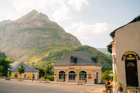 Little village with big mountains in the background in Gavarnie, France - September 12th 2023. High...