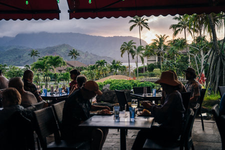 Princeville, Kauai, HI - April 24, 2023 - The Westin Resort pool and cabana at sunset in Princeville. High quality photoのeditorial素材