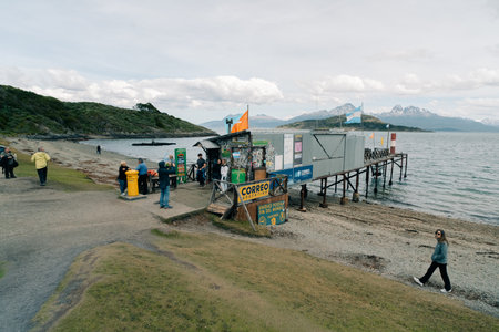 Ushuaia, Argentina - January 20, 2023 Tourists are visiting the Correo Argentino, End of the World Postal Unit. High quality photoのeditorial素材