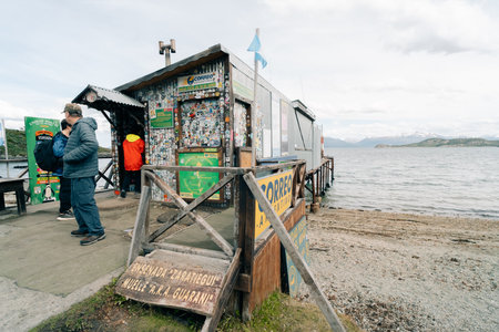 Ushuaia, Argentina - January 20, 2023 Tourists are visiting the Correo Argentino, End of the World Postal Unit. High quality photoのeditorial素材